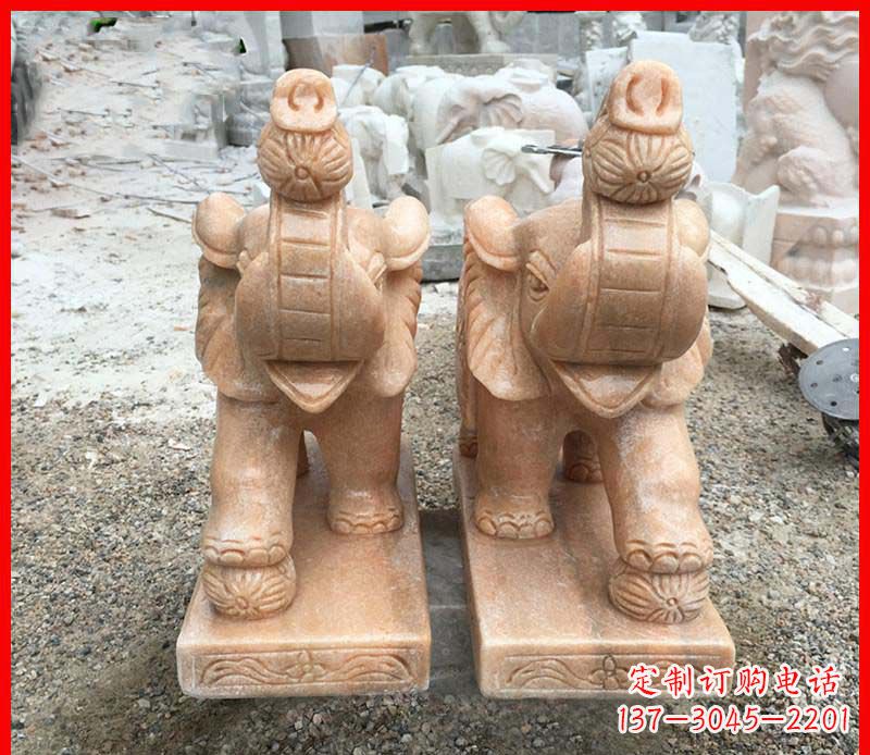 山西鼻卷绣球的小象石雕