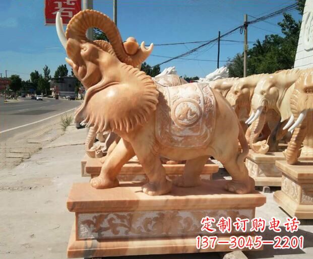 山西鼻子朝天晚霞红门口大象石雕