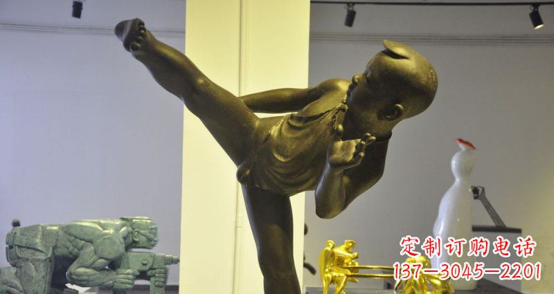 山西领雕塑男孩练功夫铜雕