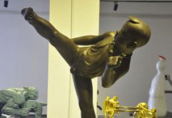 山西领雕塑男孩练功夫铜雕