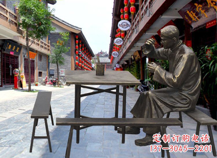山西享受下午茶时光的店小二喝茶雕塑