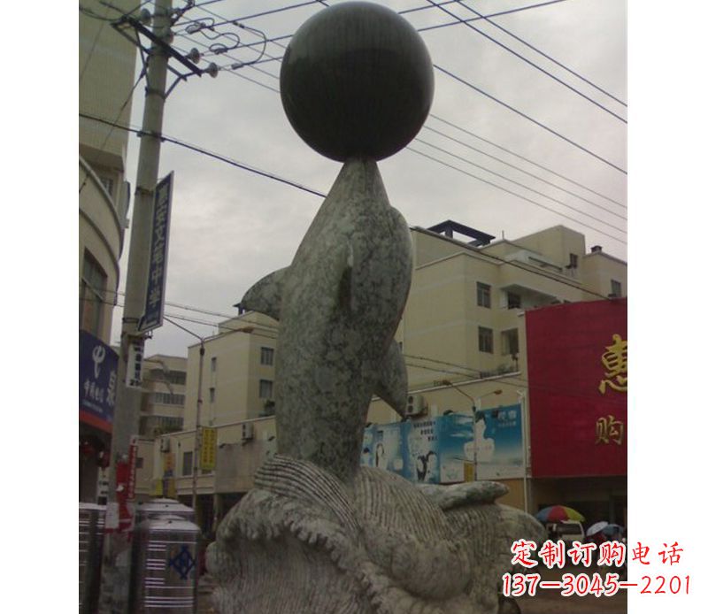 山西海豚戏球石雕