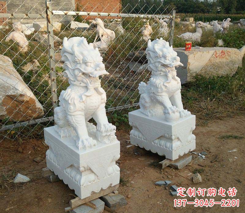 山西汉白玉门口踩球麒麟石雕
