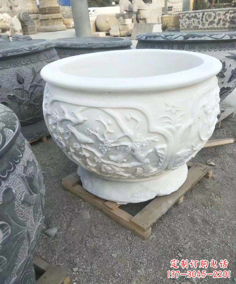 山西汉白玉材质可爱水缸雕塑