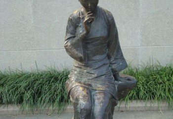 山西描绘心灵世界的街边低头思考的女孩景观铜雕