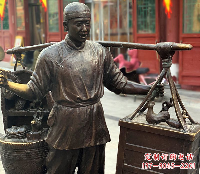 山西铜雕步行街卖货郎人物雕塑