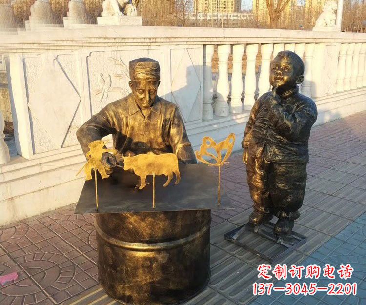 山西铜雕画糖人的人物