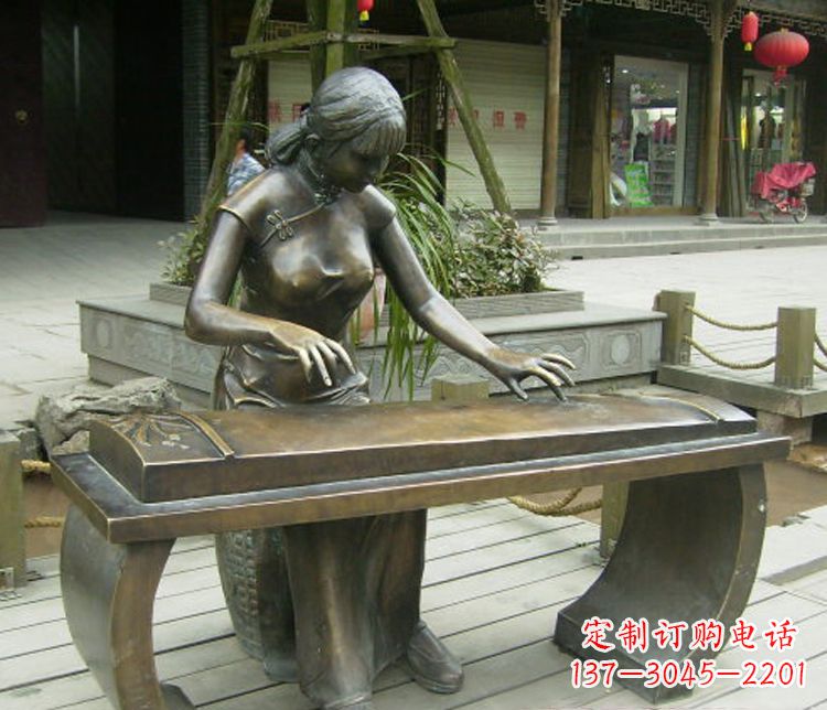 山西铜雕现代人物弹古筝雕塑
