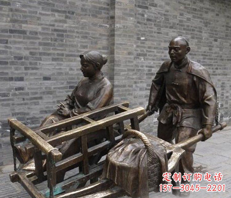 山西推独轮车的人物铜雕