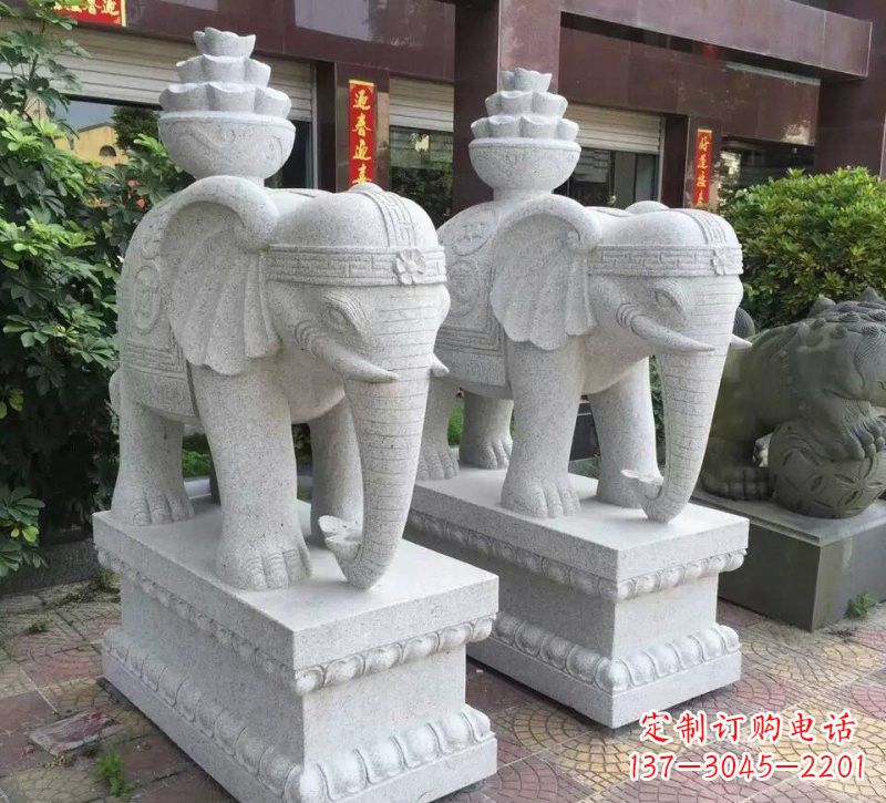 山西驮元宝的大象石雕