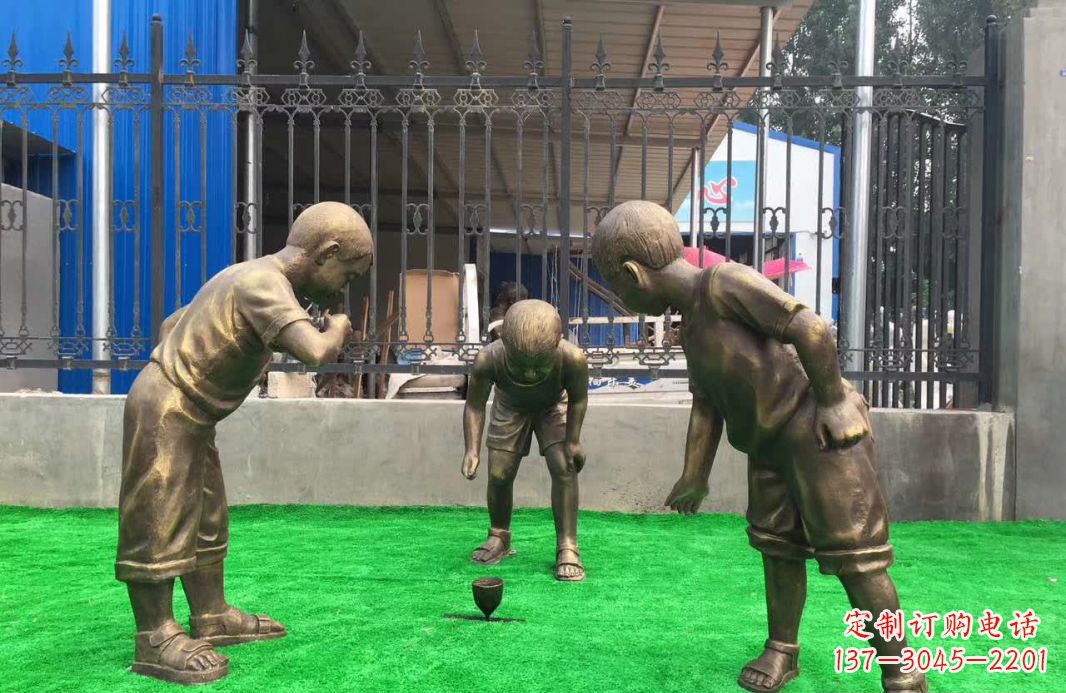 山西玩陀螺儿童铜雕塑