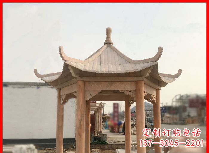山西晚霞红公园六角石雕凉亭