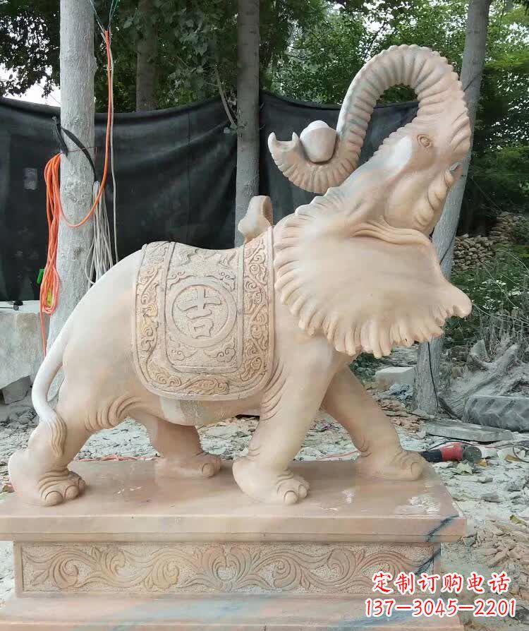 山西晚霞红卷元宝大象雕塑