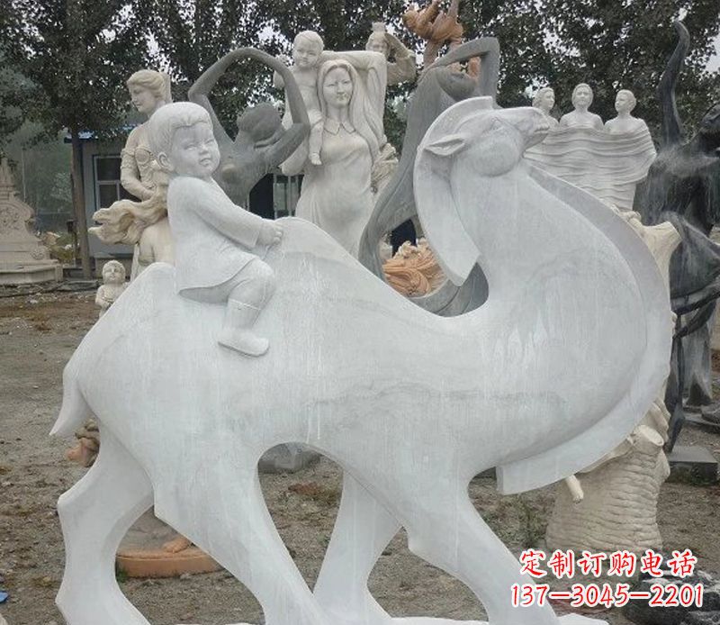 山西小孩骑骆驼石雕