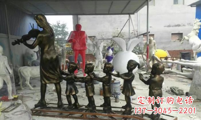 山西校园老师和儿童铜雕