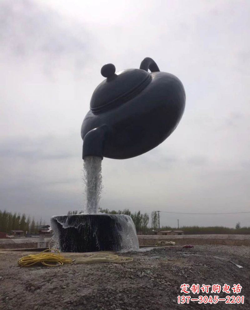 山西新疆流水的茶壶铜雕